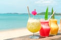 Colorful mocktails at the beach bar. Vacation, get away, summer outing concept Royalty Free Stock Photo