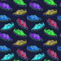 Colorful modern sneakers of bright neon color palette, seamless pattern on dark blue background