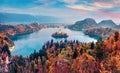 Colorful morning scene of Pilgrimage Church of the Assumption of Maria. Aerial autumn view of Bled lake, Julian Alps, Slovenia, Eu Royalty Free Stock Photo