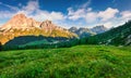 Colorful morning view of Cristallo group mountain range in National Park Tre Cime di Lavaredo.