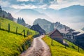 Colorful morning view of Stansstad village, Switzerland, Europe. Foggy autumn scene of Lucerne lake. Nice landscape of Swiss Alp