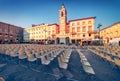 Colorful morning view of Tre Martiri square with empty sit.