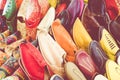 Colorful Moroccan shoes alignment in a shop. Oriental shoes in a