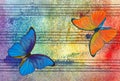 Colorful morpho butterflies and notes.  Photo of old music sheet in blue watercolor paint. Royalty Free Stock Photo