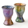 Colorful mosaic patterned vases displayed on a white background Royalty Free Stock Photo