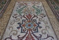 Colorful mosaic floral tiling pattern in rectangular frame