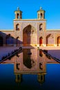 Colorful Mosque Nasir al Mulk in Shiraz. Reflection in water.