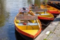 Colorful motor boats in the canals of famous Giethoorn village, Netherlands Royalty Free Stock Photo