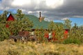 Red cabin with low storm clouds overhead Royalty Free Stock Photo