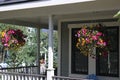 Colorful Mountain porch wraps around the home Royalty Free Stock Photo