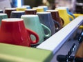 Colorful mugs on Coffee Machine Cafe Restaurant Royalty Free Stock Photo