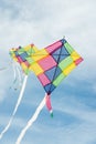 Colorful multi-color kites flying in blue sky