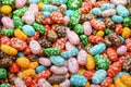 Colorful multicolored dragee, chocolate covered nuts drops. fruit sauce. colorful candies Royalty Free Stock Photo