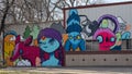 Colorful mural by Nicky Davis on a building at 626 Singleton Blvd in Dallas, Texas.
