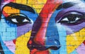 Colorful mural painted on brick graffiti wall, world art day design