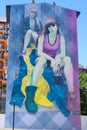 Girls painted on walls of multiple family dwelling in La Boca, Buenos Aires, Argentina