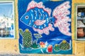 Colorful mural of a tropical fish and cactus in La Paz