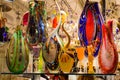 Colorful Murano Glass pottery displayed in a Venice shop window