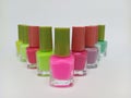 Colorful nail polish bottles arranged on a white background Royalty Free Stock Photo