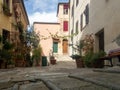 Colorful narrow streets in the medieval town of Massa Marittima in Tuscany - 5 Royalty Free Stock Photo