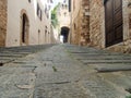 Colorful narrow streets in the medieval town of Massa Marittima in Tuscany - 4 Royalty Free Stock Photo