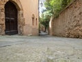 Colorful narrow streets in the medieval town of Massa Marittima in Tuscany - 7 Royalty Free Stock Photo