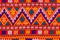 Colorful of native thai style silk and textiles pattern. Beautiful handmade woven fabrics thai silk fabric textured, with Royalty Free Stock Photo