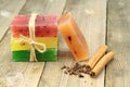 Colorful natural herbal soaps with cloves, cinnamon and fruits