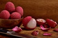 Colorful Natural organic Lychees in a wooden bowl