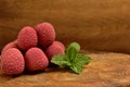 Colorful Natural organic Lychees on a wooden board