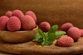 Colorful Natural organic Lychees in a wooden bowl