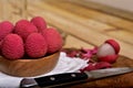 Colorful Natural organic Lychees in a wooden bowl