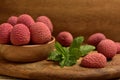 Colorful Natural organic Lychees in a wooden bowl