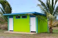 Colorful neat clean green public restroom facility