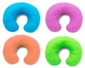 4 Colorful neck pillows Royalty Free Stock Photo