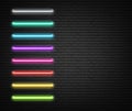 Colorful neon luminous strips on grey realistic bricklaying wall