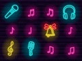 Colorful neon music and entertainment signs and icons set Royalty Free Stock Photo
