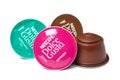 Colorful Nescafe expresso and tea capsules, the famous french brand of coffee dose on white background
