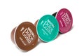 Colorful Nescafe expresso and tea capsules, the famous french brand of coffee dose on white background