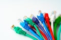 Colorful network cables switch on white background close up