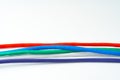 Colorful network cables switch on white background close up