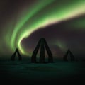 A colorful night with aurora borealis flying over the stonehenge iceland. Arctic henge in north Iceland. Raufarhofn