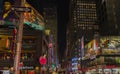 Colorful night Broadway landscape view. Led lights on dark night sky background. New York.