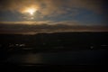 Colorful night landscape with lake, mountains, full moon, blue sky Khojasan Lake, Baku, Azerbaijan. Panoramic photo. Royalty Free Stock Photo