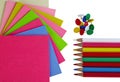 Colorful note papers pencils and pushpins on white Royalty Free Stock Photo