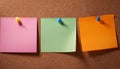 Colorful note papers. Post it notes on cork board Royalty Free Stock Photo