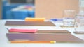 Colorful Note Papers on the Table with Glasses and Water Bottles in the Meeting Room Royalty Free Stock Photo