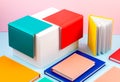 Colorful notebooks over the blue pastel background. Modern abstract working space Royalty Free Stock Photo