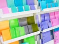 Colorful notebooks on shelf in store Royalty Free Stock Photo