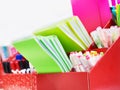 Colorful notepads and pens on shelf in store Royalty Free Stock Photo